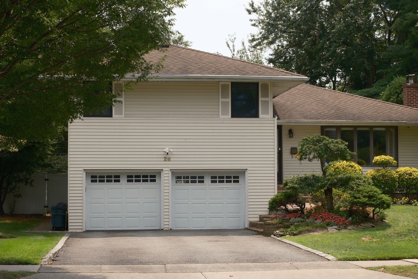 Suburban house with a double garage door