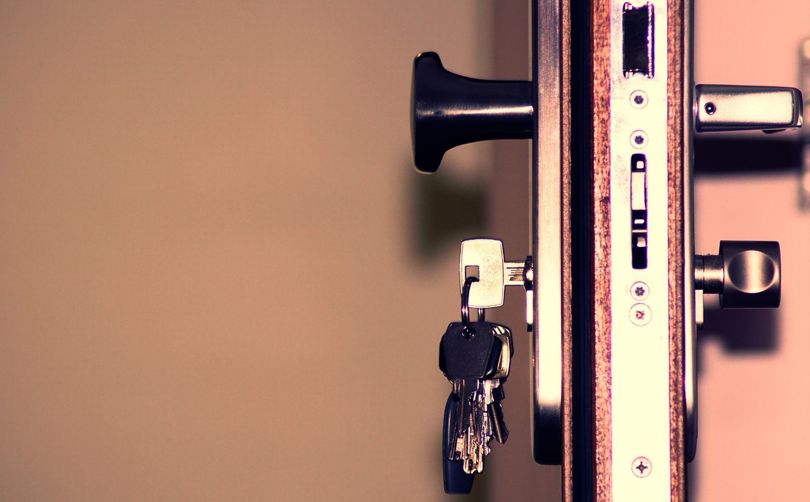 Keys hanging from a residential door lock