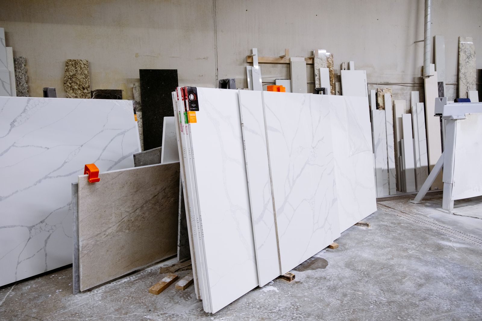 Granite and marble slabs stored in a fabrication shop